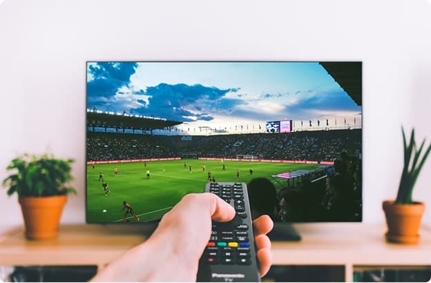 A person streaming a football match on a Panasonic TV