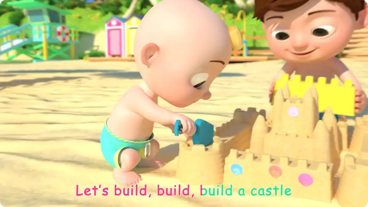 A still from the CoComelon&#39;s Beach song; JJ building a sand castle