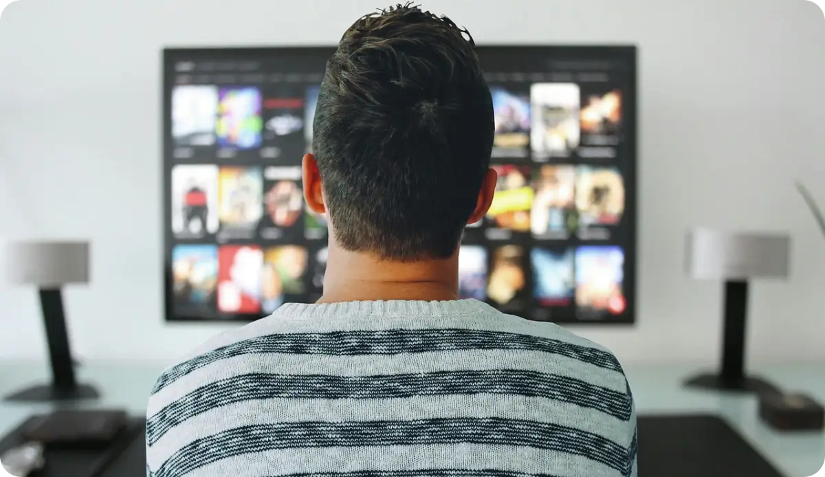 A man watching OTT TV platform