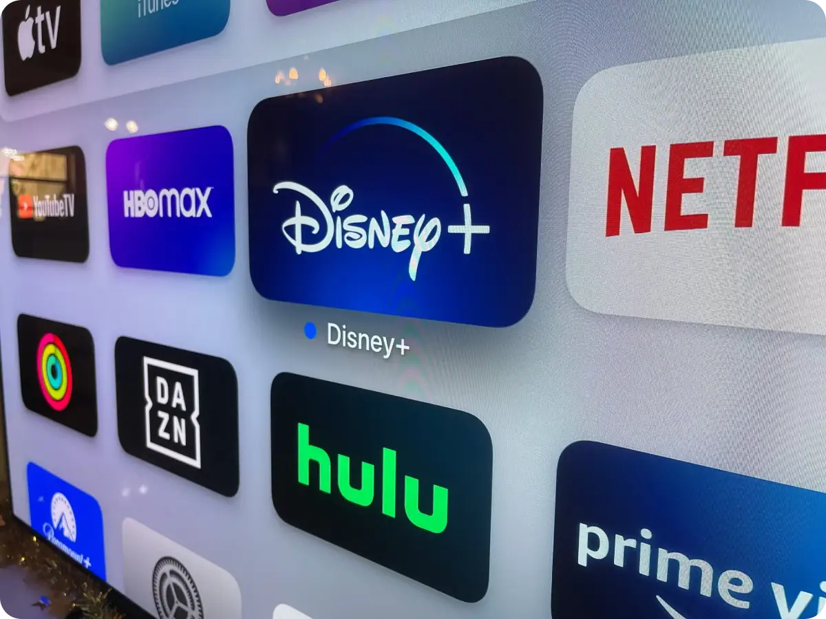 Disney+ selected amongst multiple ott streaming platforms loaded on a TV